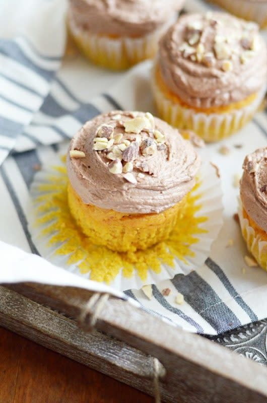 <p>Something Swanky</p><p> Soft and moist, spiced pumpkin cupcakes perfectly paired with whipped Nutella buttercream.</p><p><strong>Get the recipe: </strong><a href="https://www.somethingswanky.com/cake-mix-pumpkin-nutella-cupcakes/" rel="nofollow noopener" target="_blank" data-ylk="slk:Pumpkin Nutella Cupcakes Recipe;elm:context_link;itc:0;sec:content-canvas" class="link rapid-noclick-resp"><strong>Pumpkin Nutella Cupcakes Recipe</strong></a></p><p><strong>Related:</strong> <a href="https://parade.com/622229/m-b-roberts/which-thanksgiving-side-dish-is-your-states-favorite/" rel="nofollow noopener" target="_blank" data-ylk="slk:Which Thanksgiving Side Dish Is Your State's Favorite?;elm:context_link;itc:0;sec:content-canvas" class="link rapid-noclick-resp"><strong>Which Thanksgiving Side Dish Is Your State's Favorite?</strong></a></p>