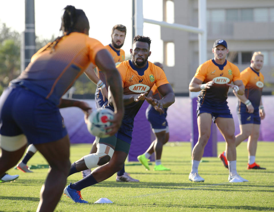 South Africa's Siya Kolisi, center, plays during the team's training in Urayasu, near Tokyo Tuesday, Sept. 17, 2019, ahead of Rugby World Cup match against New Zealand. (Takumi Sato/Kyodo News via AP)