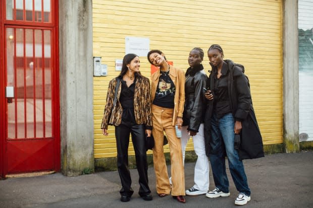 On the street at Milan Fashion Week Fall 2021.