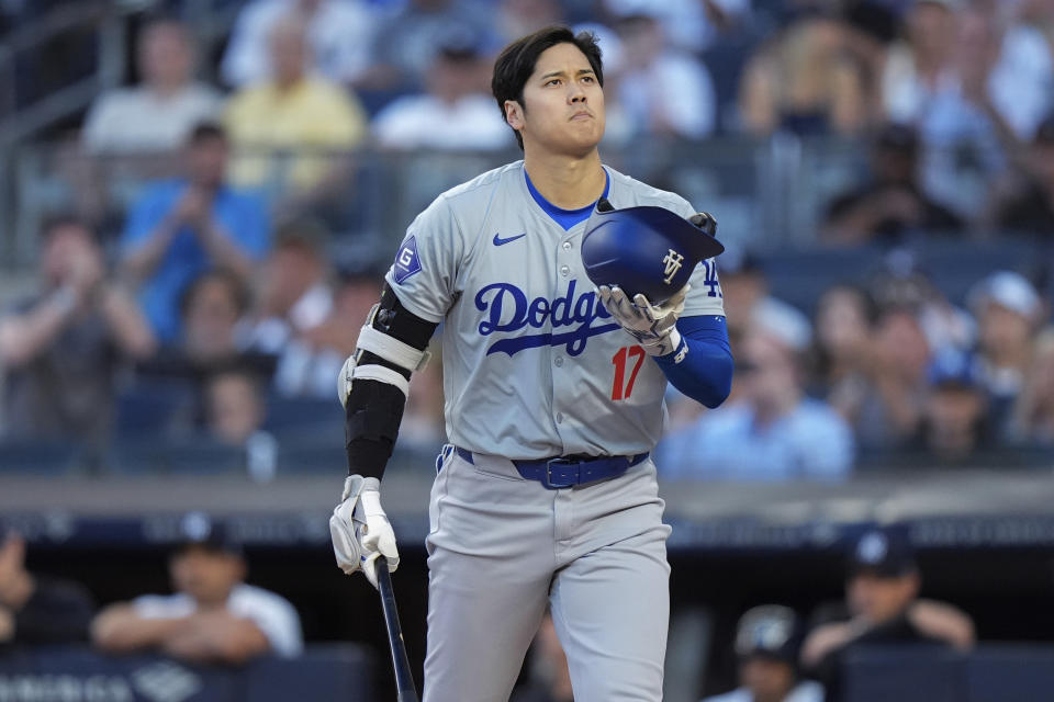 Los Angeles Dodgers' Shohei Ohtani reacts after striking out during the first inning of the team's baseball game against the New York Yankees, Saturday, June 8, 2024, in New York. (AP Photo/Frank Franklin II)