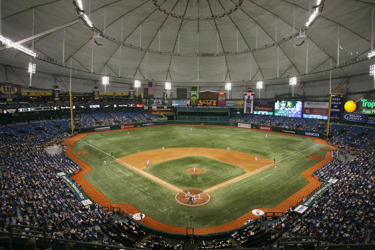 Field and filled seating area of Tropicana Field, St. Petersburg, Florida, home of the Tampa Bay Rays during a game with closed top