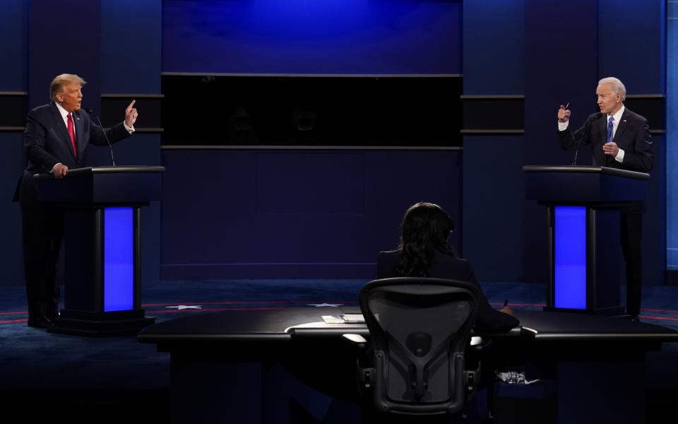 FILE - U.S. President Donald Trump, left, and Democratic presidential candidate former Vice President Joe Biden attend the second and final presidential debate Oct. 22, 2020, at Belmont University in Nashville, Tenn. (AP Photo/Patrick Semansky, File)