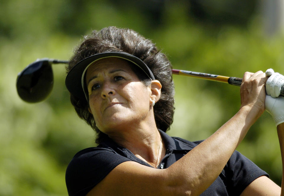 FILE - In this June 22, 2007 file photo, Nancy Lopez watches her tee shot on the third hole during the second round of the Wegmans LPGA golf tournament at Locust Hill Country Club in Pittsford, N.Y. Lopez has a book deal. Lopez has an agreement with HarperOne, a division of HarperCollins Publishers, for a memoir scheduled to be published in June. HarperOne announced the deal Tuesday, Sept. 3, 2013, and says the book is currently untitled. (AP Photo/Don Heupel, File)