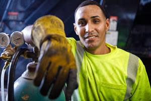 A Casella diesel technician pauses for a photo.