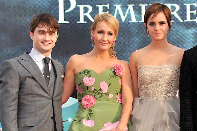 <p>Jon Furniss/WireImage</p> Daniel Radcliffe, J.K. Rowling and Emma Watson in 2011