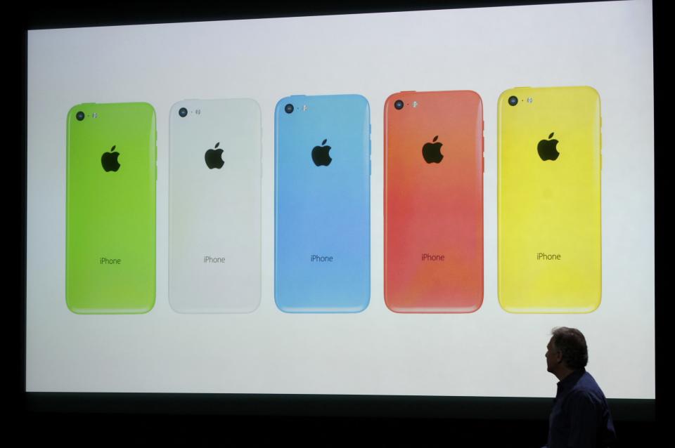 The five colors of the new iPhone 5C are seen on screen at Apple Inc's media event in Cupertino