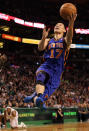 BOSTON, MA - MARCH 04: Jeremy Lin #17 of the New York Knicks heads for the net as Paul Pierce #34 of the Boston Celtics is down on March 4, 2012 at TD Garden in Boston, Massachusetts. The Boston Celtics defeated the New York Knicks 115-111 in overtime. NOTE TO USER: User expressly acknowledges and agrees that, by downloading and or using this photograph, User is consenting to the terms and conditions of the Getty Images License Agreement. (Photo by Elsa/Getty Images)