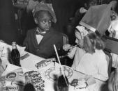 <p>Kids weren't often on the guest list at dinner parties back in the day. Instead, their dinner would be served before guests arrived and they would be sent to their bedrooms to play. Or, if they were invited, they sat at the kids' table.</p>