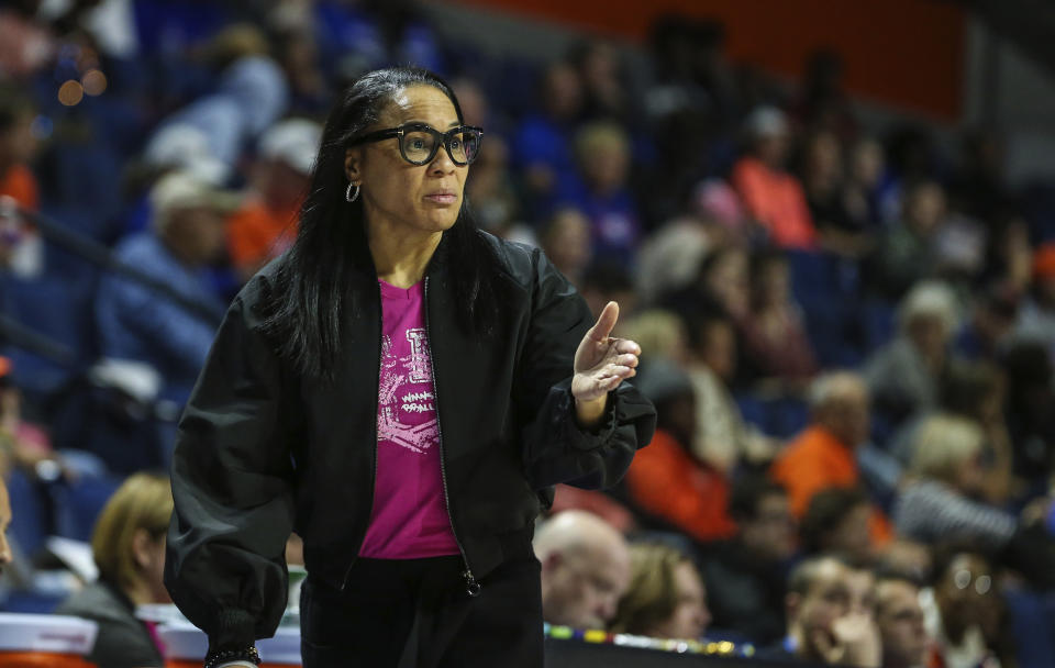 South Carolina head coach Dawn Staley reacts to a play during the second half of an NCAA college basketball game against Florida, Thursday, Feb. 27, 2020, in Gainesville, Fla. (AP Photo/Gary McCullough)