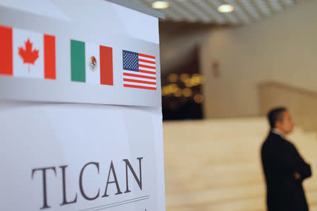 A NAFTA banner is seen during the fifth round of NAFTA talks involving the United States, Mexico and Canada, in Mexico City, Mexico November 17, 2017. REUTERS/Carlos Jasso