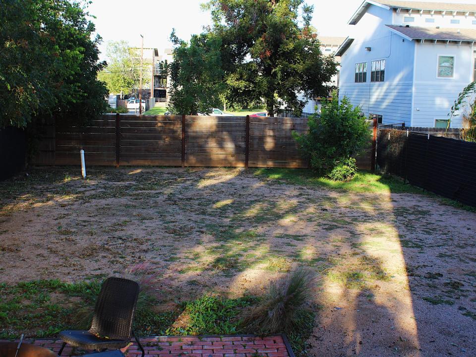 fixer upper shotgun house backyard