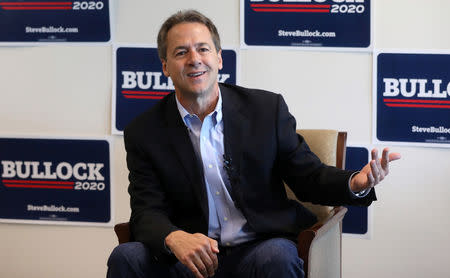 Montana Governor Steve Bullock talks to the media as he launches a 2020 U.S. presidential campaign in Helena, Montana, U.S., May 14, 2019. REUTERS/Jim Urquhart