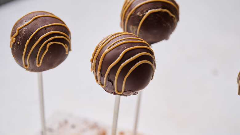 cake pop drizzled with peanut butter