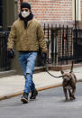 <p>Justin Theroux bundles up to walk his dog out on Monday in N.Y.C.'s West Village.</p>