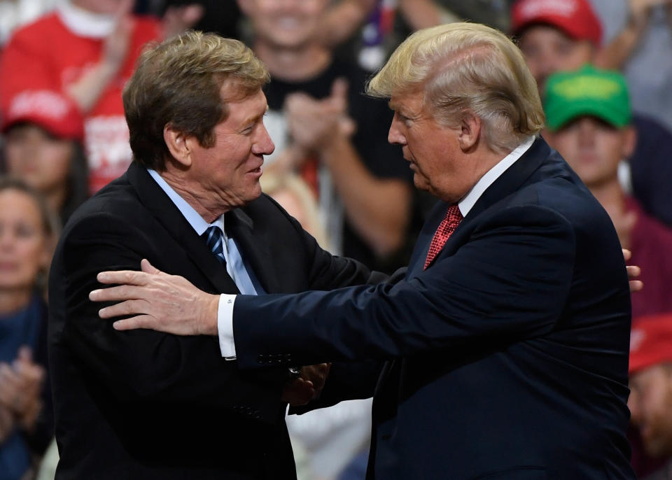 President Donald Trump greets then-Rep. Jason Lewis (R-Minn.) at a campaign rally on Oct. 4, 2018. (Photo: Hannah Foslien via Getty Images)