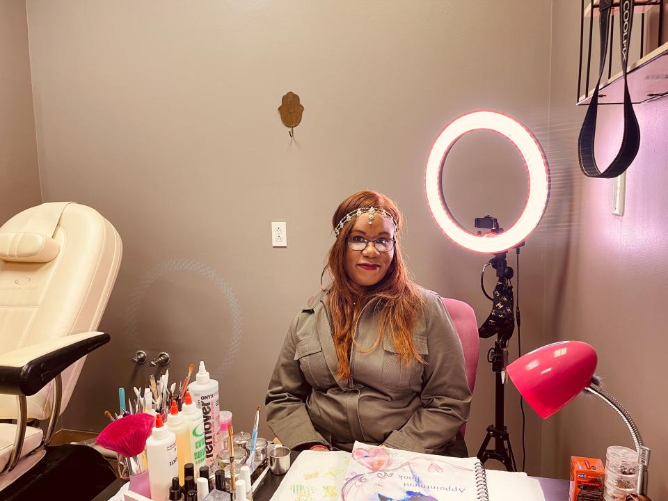 Rain is setting up her nail technician service at URZ Professional, Nov. 3, 2021.