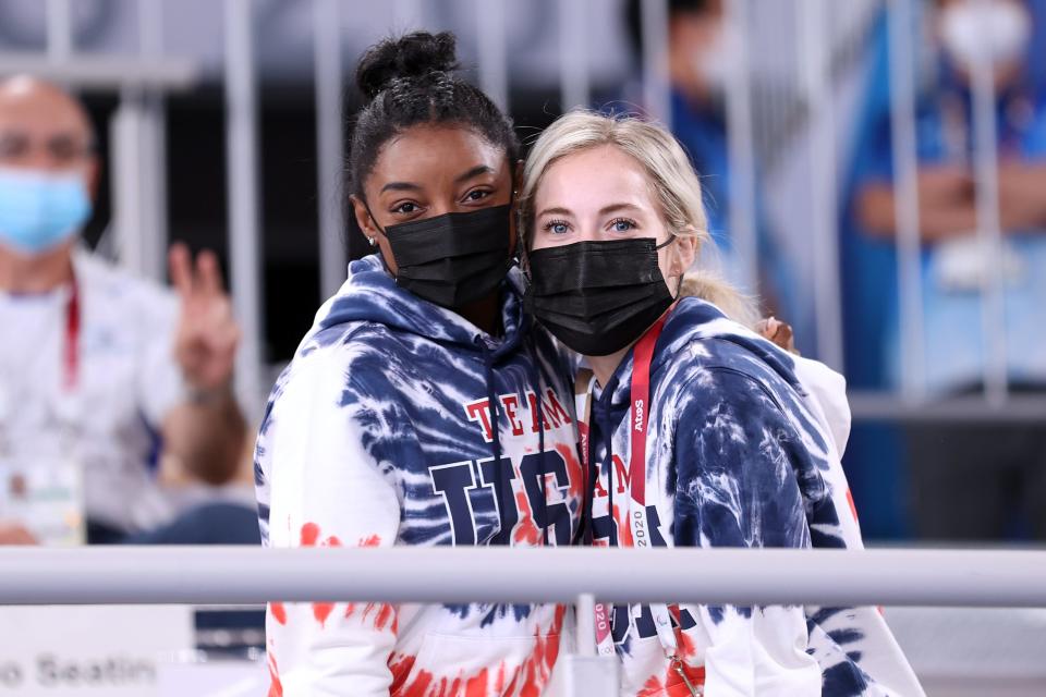 Simone Biles and MyKayla Skinner watch the Men's All-Around Final on day five of the Tokyo 2020 Olympic Games.