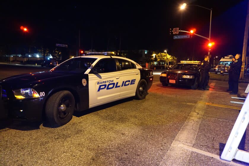 SAN BERNARDINO, CA - DECEMBER 02: Barstow police officers stand guard as they investigate the crime scene on December 2, 2015 in San Bernardino, California. Two suspects in a deadly mass shooting that killed 14 victims at a social services facility in California were killed after a confrontation with police, authorities said Wednesday. The initial shooting occurred earlier Wednesday when at least one shooter opened fire in San Bernardino at the Inland Regional Center, which provides services to persons with developmental disabilities and their families. At least 17 others were injured. (Photo by Mintaha Neslihan Eroglu/Anadolu Agency/Getty Images)