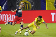 New England Revolution forward Diego Fagundez, left, and Nashville SC midfielder Anibal Godoy, right, collide during the first half of an MLS soccer match Friday, Oct. 23, 2020, in Nashville, Tenn. (AP Photo/Mark Humphrey)