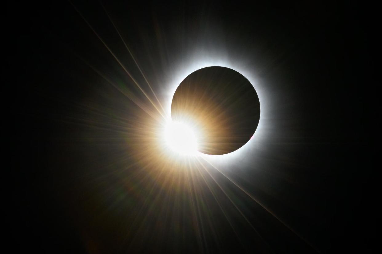 Baily’s beads are seen as sunlight shines through mountains and valleys on the moon during the total solar eclipse as seen from Lancaster, N.H., Monday, April 8, 2024.