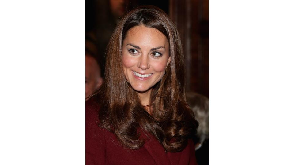 Kate Middleton laughs as she visits Middle Temple on October 8, 2012 in London, England. 