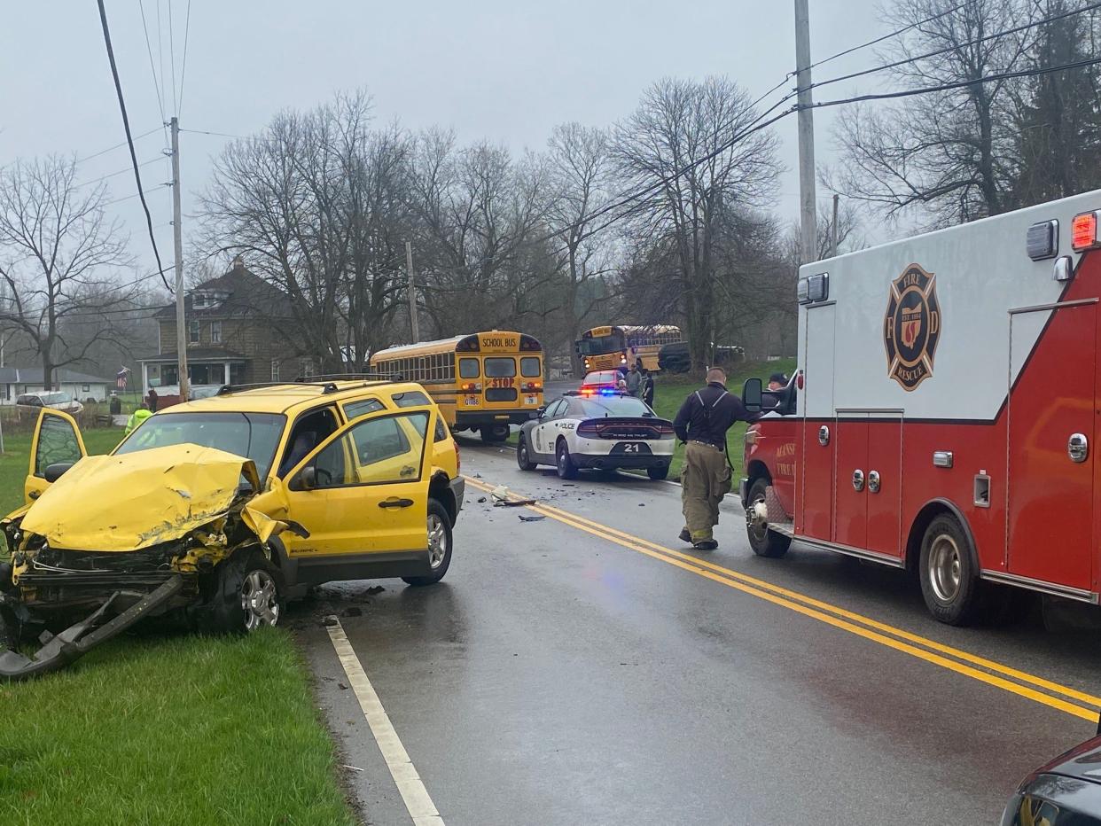 A Madison School bus and a vehicle collided around 4 p.m. Wednesday on Oak Street. No students on the bus were seriously injured. One person in the yellow vehicle was transferred to a local hospital, a Mansfield fire official said.