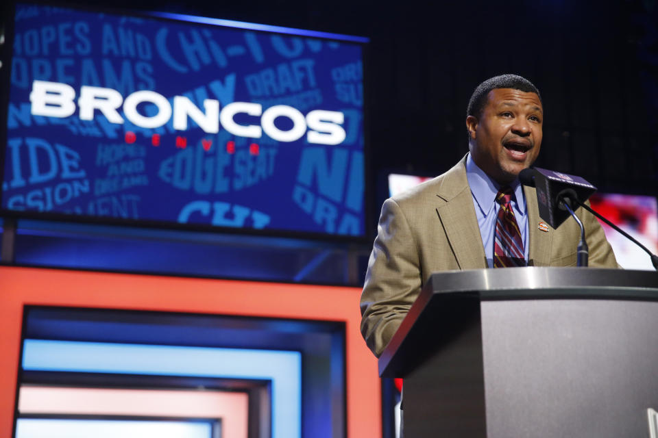 FILE - Former NFL player Steve Atwater announces that the Denver Broncos select Georgia Tech's Adam Gotsis as the 63rd pick in the second round of the 2016 NFL football draft in Chicago, in this Friday, April 29, 2016, file photo. Chances are slim the Broncos would have dethroned the defending champion Green Bay Packers in Super Bowl XXXII were it not for the outstanding play of free safety Steve Atwater. (AP Photo/Charles Rex Arbogast, File)