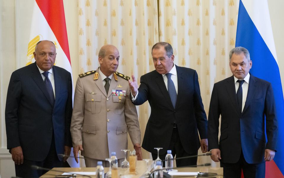 Russian Foreign Minister Sergey Lavrov, second right, welcomes for the talks Egyptian Defense Minister Mohamed Zaki, second left, Egyptian Foreign Minister Sameh Shoukry, left, and Russian Defense Minister Sergei Shoigu, right, during their meeting in Moscow, Russia, Monday, June 24, 2019. Egyptian President Abdel-Fattah el-Sissi has moved to increase military cooperation with Russia, and the two nation as foreign and defense ministers have held regular meetings. (AP Photo/Alexander Zemlianichenko)
