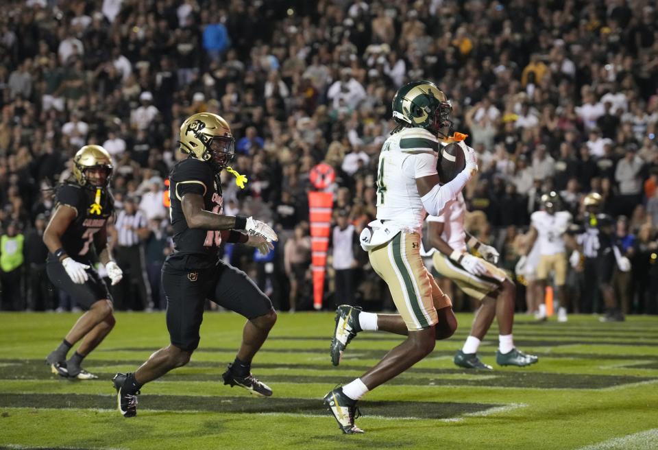 Colorado State receiver Tory Horton pulls in a touchdown pass against Colorado Saturday, Sept. 16, 2023, in Boulder, Colo. Horton has caught 45 passes for 540 yards and leads the country in receiving yards (135) and receptions (11.2) per game. | David Zalubowski, Associated Press