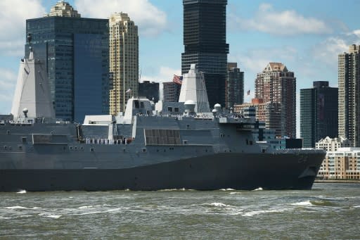 The USS Arlington (pictured May 2018), which transports marines, amphibious vehicles, conventional landing craft and rotary aircraft, will head toward the Gulf after intelligence reports suggested Iran was planning some sort of attack in the region