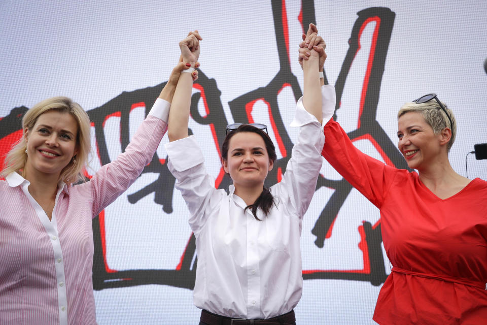 FILE - Maria Kolesnikova, right, Svetlana Tsikhanouskaya, center, a candidate for president, and Veronkika Tsepkalo, left, wife of non-registered candidate Valery Tsepkalo, gesture at a meeting in Minsk, Belarus, Sunday, July 19, 2020. It's been a year since Kolesnikova last wrote a letter to her family from behind bars, her father says. No one has seen Kolesnikova, who is serving 11 years in prison for organizing anti-government rallies, or heard from her since Feb. 12, 2023. (AP Photo, File)