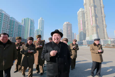 North Korean leader Kim Jong Un inspects the construction site of Ryomyong Street, in this undated photo released by North Korea's Korean Central News Agency (KCNA) on January 26, 2017. KCNA via REUTERS