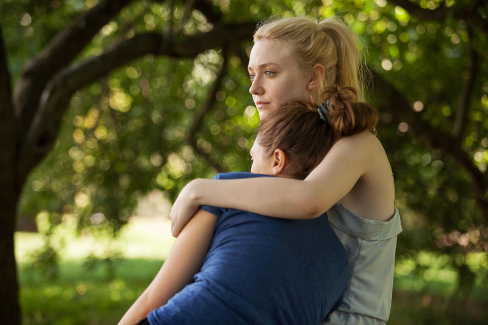 This undated publicity film image provided by the Sundance Institute shows Dakota Fanning, right, and Elizabeth Olsen, in the film "Very Good Girls," included in the narrative premieres at the 2013 Sundance Film Festival in January. (AP Photo/Sundance Institute, Jessica Miglio)