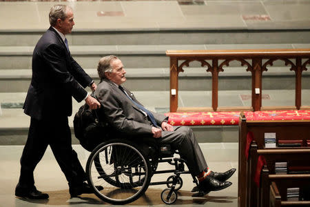 Former Presidents George W. Bush, and George H.W. Bush arrive at St. Martin's Episcopal Church for funeral services for former first lady Barbara Bush in Houston, Texas, U.S., April 21, 2018. David J. Phillip/Pool via Reuters
