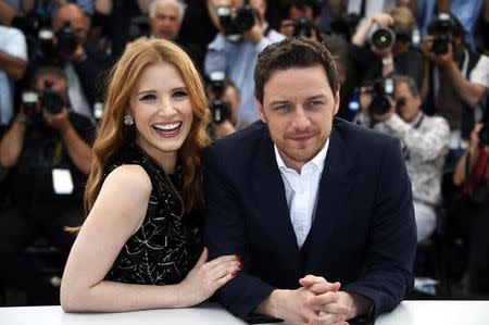 Cast members Jessica Chastain (L) and James McAvoy pose during a photocall for the film "The Disappearance of Eleanor Rigby" in competition for the category "Un Certain Regard" at the 67th Cannes Film Festival in Cannes May 18, 2014. REUTERS/Eric Gaillard