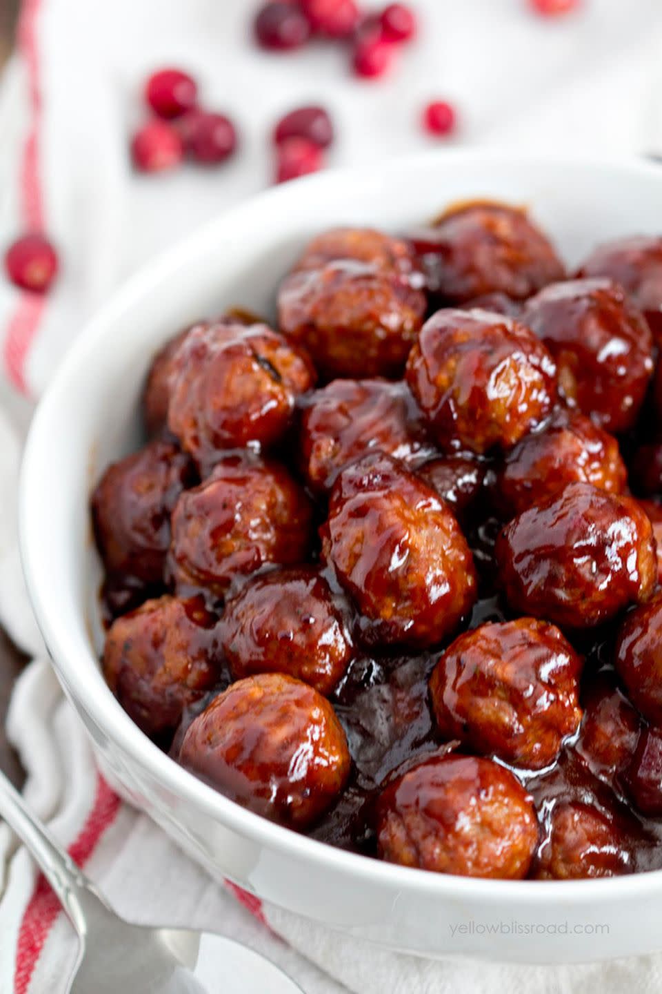 <p>Give everyone's favorite appetizer a sweet and spicy makeover with this homemade sauce. </p><p><strong>Get the recipe at <a href="http://www.yellowblissroad.com/spicy-cranberry-barbecue-meatballs/" rel="nofollow noopener" target="_blank" data-ylk="slk:Yellow Bliss Road;elm:context_link;itc:0;sec:content-canvas" class="link ">Yellow Bliss Road</a>.</strong></p>