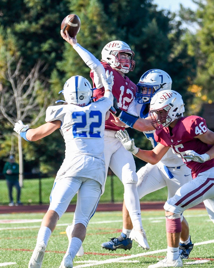 U-Prep's Connor Gilbreath (7) puts pressure on the Sacred Heart Prep quarterback. The Sacred Heart Prep Gators defeated the University Prep (Redding) Panthers 20-0 to win the CIF 5-A North championship on Saturday, Dec. 4, 2021.