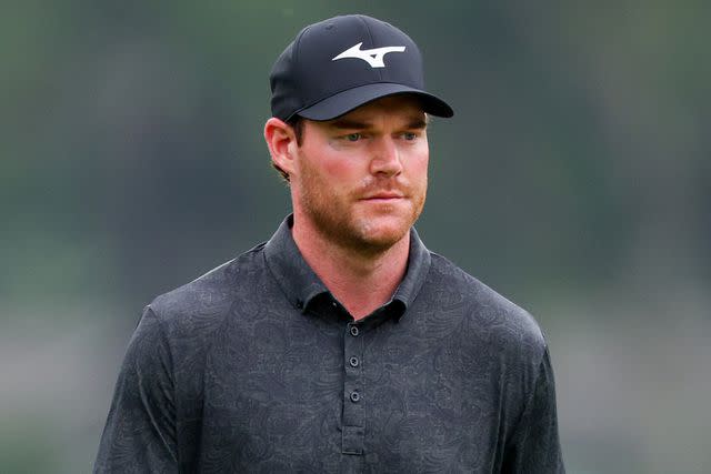 <p> Andrew Redington/Getty</p> Grayson Murray walks the fifth hole during the second round of the RBC Heritage at Harbour Town Golf Links on April 19, 2024