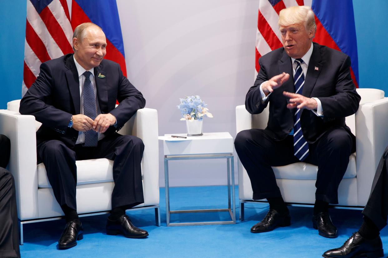 Former President Donald Trump speaks during a meeting with Russian President Vladimir Putin at the G20 Summit in 2017 in Hamburg.