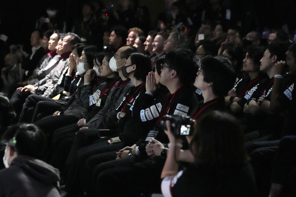 Takeshi Hakamada, founder and CEO of ispace, right, and his team staff watch livestream of HAKUTO-R private lunar exploration program on screen at the lunar landing event Wednesday, April 26, 2023, at Miraikan, the National Museum of Emerging Science and Innovation, in Tokyo. Tokyo's ispace tried to land its own spacecraft on the moon early on Wednesday, but its fate was unknown as flight controllers lost contact with it moments before the planned touchdown. (AP Photo/Eugene Hoshiko)