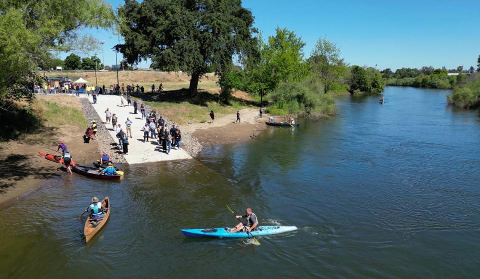 Paddlers arrive in kayaks and canoes at the newly opened Neece Drive Boat Launch at Tuolumne River Regional Park in Modesto, Calif., Friday, May 10, 2024.