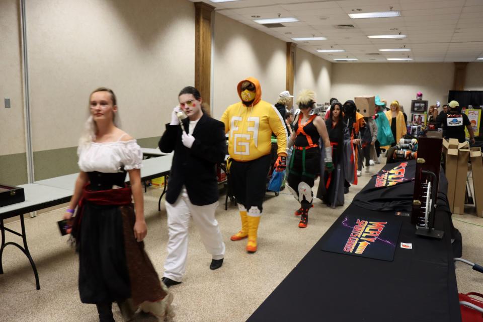 Contestants parade around the room for the costume contest during the Amarillo Super Mini-Con at the Amarillo Civic Center in this 2022 file photo.