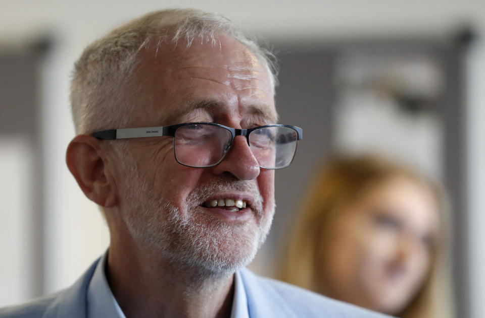 Britain's opposition leader Jeremy Corbyn meets business leaders at the Business and Technology Centre, Stevenage, England, Tuesday Aug. 20, 2019, to discuss the impact of leaving the EU without a deal. (AP Photo/Frank Augstein)