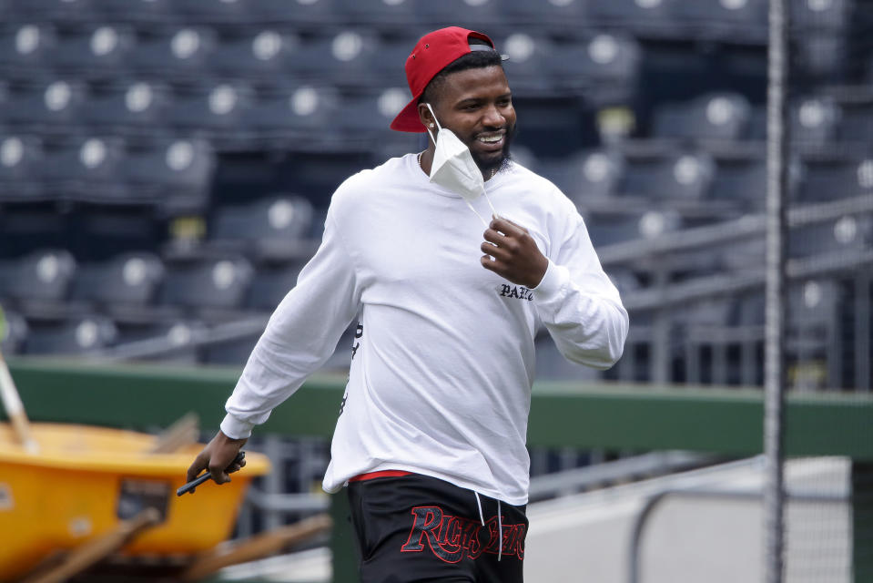 Pittsburgh Pirates' Gregory Polanco arrives for a team workout at a "summer camp" baseball practice in Pittsburgh, Tuesday, July 7, 2020. (AP Photo/Gene J. Puskar)