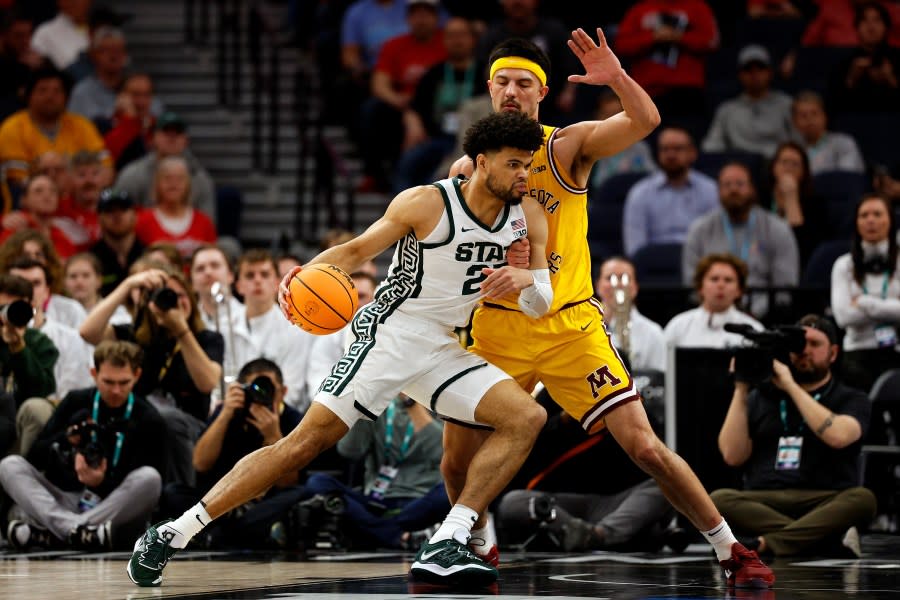 MINNEAPOLIS, MINNESOTA – MARCH 14: Malik Hall #25 of the Michigan State Spartans goes to the basket against Dawson Garcia #3 of the Minnesota Golden Gophers in the second half in the Second Round of the Big Ten Tournament at Target Center on March 14, 2024 in Minneapolis, Minnesota. The Spartans defeated the Golden Gophers 77-67. (Photo by David Berding/Getty Images)