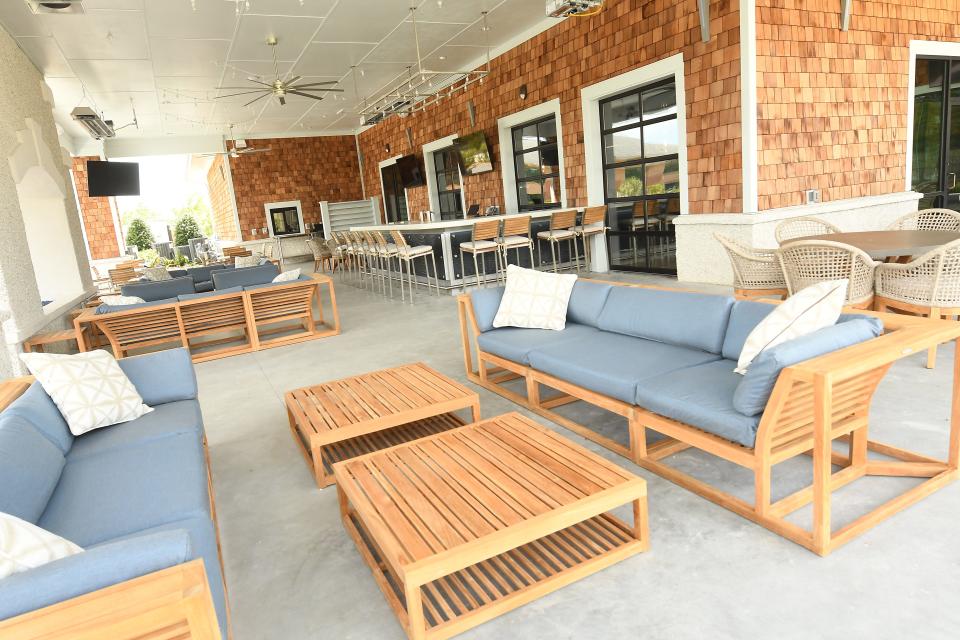 A covered outdoor lounge at Blue Surf Arboretum West, 414 Arboretum Drive near Mayfaire. STARNEWS FILE PHOTO