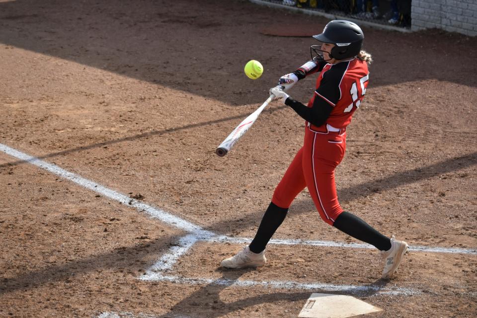 Bailee Tieman lofts a ball into the air against Mitchell.