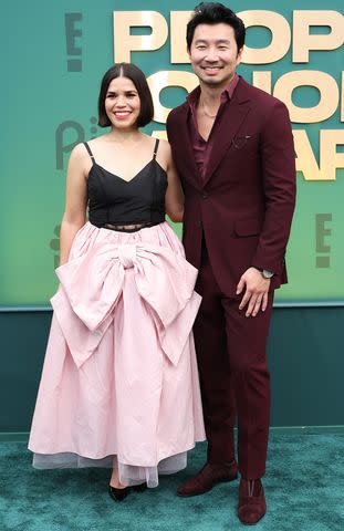 <p>Monica Schipper/Getty Images</p> Simu Liu and America Ferrera pose together at the 2024 People's Choice Awards