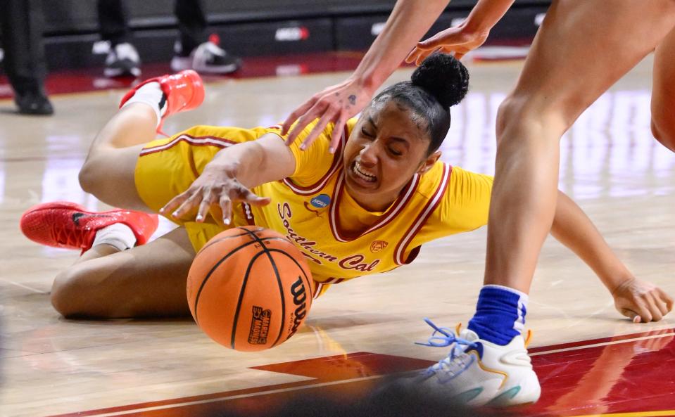 USC guard JuJu Watkins goes to the floor for a loose ball during an NCAA Tournament second round game against Kansas at Galen Center.