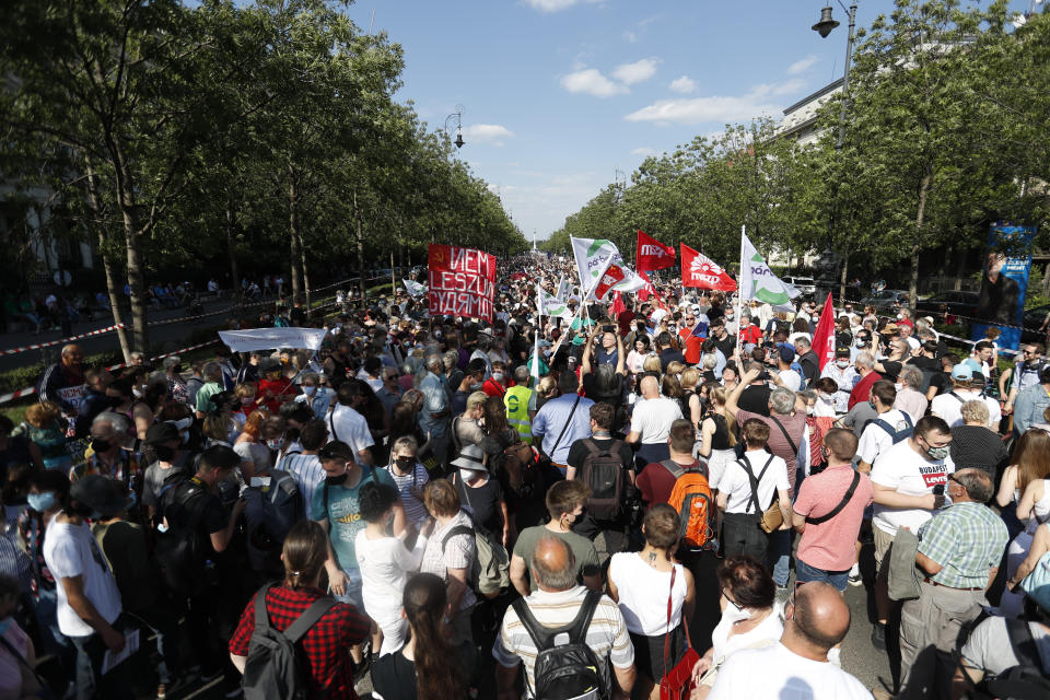 Protesters gather in Budapest, Hungary, Saturday, June 5, 2021. Thousands of people gathered opposing the Hungarian government's plan of building a campus for China's Fudan University in Budapest. (AP Photo/Laszlo Balogh)